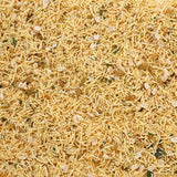 Close-up view of crunchy and lightly spiced farali chivda with peanuts and cashews.
